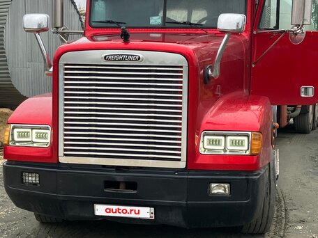 1999 Freightliner FLD, красный, 2600000 рублей, вид 1