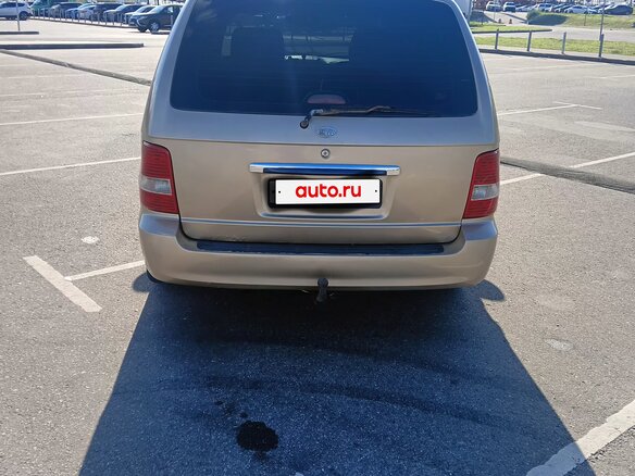 2004 Kia Carnival I Рестайлинг, бежевый, 620000 рублей - вид 5