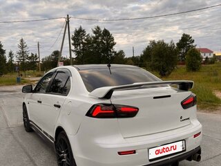 2010 Mitsubishi Lancer X, белый, 900000 рублей, вид 2