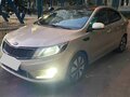 2013 Kia Rio 4-speed III, бежевый, 930000 рублей - вид 1