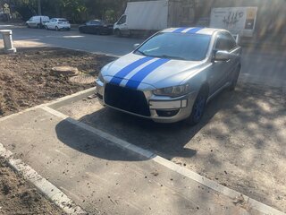 2009 Mitsubishi Lancer X, серебристый, 580000 рублей, вид 1
