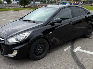 2011 Hyundai Solaris I, чёрный, 700000 рублей, вид 1