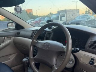 2002 Toyota Corolla IX (E120, E130), белый, 450000 рублей, вид 3