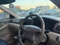 2002 Toyota Corolla IX (E120, E130), белый, 390000 рублей - вид 2