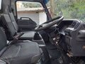 2005 Isuzu Elf (N-series), белый, 1650000 рублей - вид 6