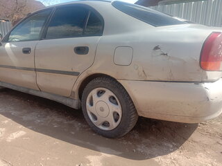 1998 Mitsubishi Carisma I, серый, 120000 рублей, вид 2