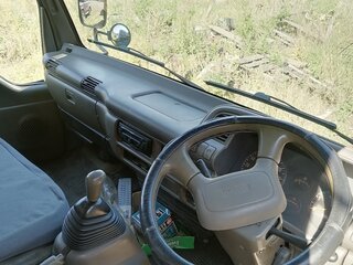 1995 Isuzu Elf (N-series), синий, 1700000 рублей, вид 4