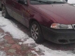 2006 Daewoo Nexia I, пурпурный, 85000 рублей, вид 4