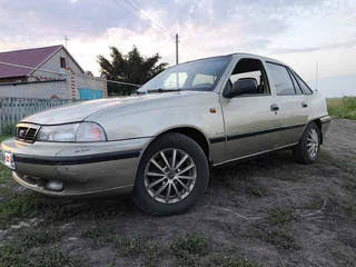 2005 Daewoo Nexia I, золотистый, 110000 рублей, вид 1