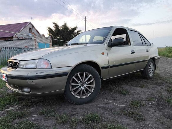 2005 Daewoo Nexia I, золотистый, 110000 рублей