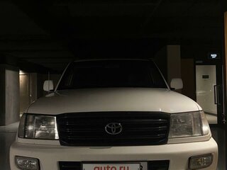 2003 Toyota Land Cruiser 105 100 Series Рестайлинг 1, белый, 1800000 рублей, вид 4