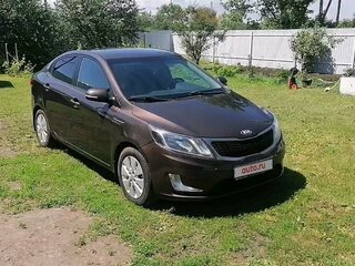 2014 Kia Rio 6-speed III, коричневый, 950000 рублей, вид 4