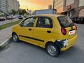 2007 Chevrolet Spark II, жёлтый - вид 2