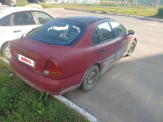 1997 Mitsubishi Carisma I, красный, 89000 рублей, вид 4