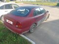1997 Mitsubishi Carisma I, красный, 89000 рублей - вид 3