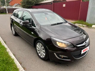 2014 Opel Astra J Рестайлинг, коричневый, 735000 рублей, вид 2
