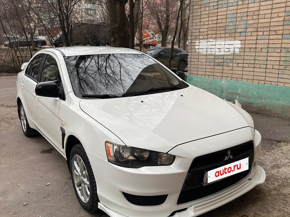 2010 Mitsubishi Lancer X, белый, 930000 рублей