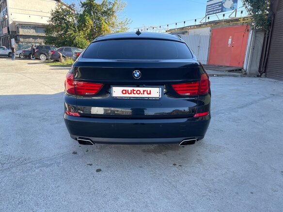 2011 BMW 5 серии Gran Turismo 550i xDrive VI (F10/F11/F07), чёрный, 1670000 рублей - вид 4