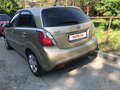 2010 Kia Rio II Рестайлинг, золотистый, 750000 рублей - вид 2