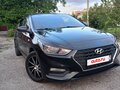2019 Hyundai Solaris II, чёрный, 1600000 рублей - вид 1