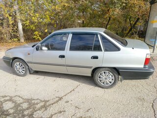 2005 Daewoo Nexia I, серебристый, 490000 рублей, вид 4