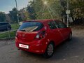 2012 Opel Corsa D Рестайлинг II, красный - вид 3