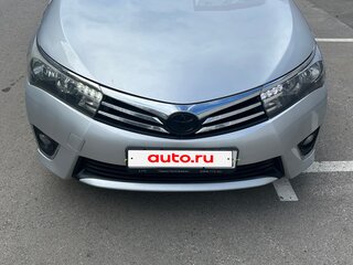 2013 Toyota Corolla XI (E160, E170, E180), серебристый, 900000 рублей, вид 2