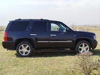 2012 Chevrolet Tahoe 6AT III, чёрный, 1400000 рублей, вид 2