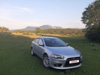 2012 Mitsubishi Lancer X Рестайлинг, серебристый, 1460000 рублей, вид 2