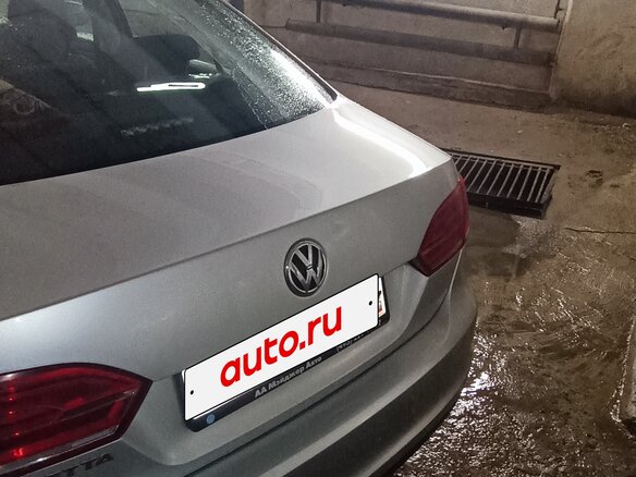 2014 Volkswagen Jetta VI Рестайлинг, серебристый, 850000 рублей - вид 7