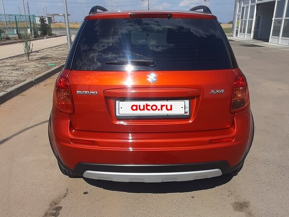 2013 Suzuki SX4 I (Classic) Рестайлинг, оранжевый, 1300000 рублей - вид 5