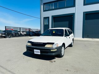 1999 Toyota Corolla VII (E100), белый, 349999 рублей, вид 2