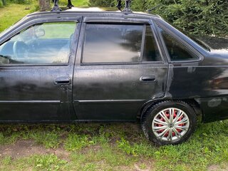 2011 Daewoo Nexia I Рестайлинг, чёрный, 125000 рублей, вид 3