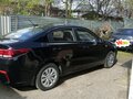 2018 Kia Rio IV, чёрный, 1360000 рублей - вид 1