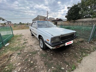1986 Nissan Laurel V (C32), белый, 370000 рублей, вид 2