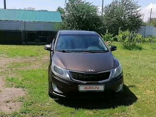 2014 Kia Rio 6-speed III, коричневый, 950000 рублей, вид 2