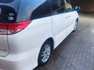 2011 Toyota Estima III Рестайлинг, белый, 2050000 рублей, вид 2