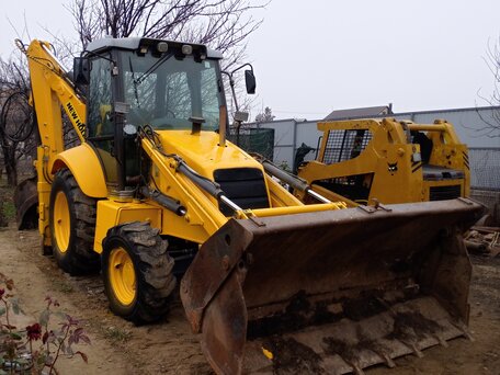 2007 New Holland B110B, жёлтый, 3699999 рублей, вид 1