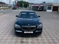 2011 BMW 7 серии 750i xDrive V (F01/F02/F04), чёрный, 2500000 рублей - вид 2