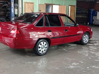 2010 Daewoo Nexia I Рестайлинг, пурпурный, 340000 рублей, вид 4