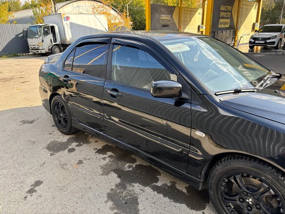 2006 Mitsubishi Lancer IX Рестайлинг, чёрный, 570000 рублей - вид 4