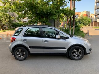 2011 Suzuki SX4 I (Classic) Рестайлинг, серебристый, 850000 рублей, вид 4