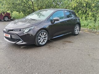 2019 Toyota Corolla XII (E210), коричневый, 1500000 рублей, вид 2