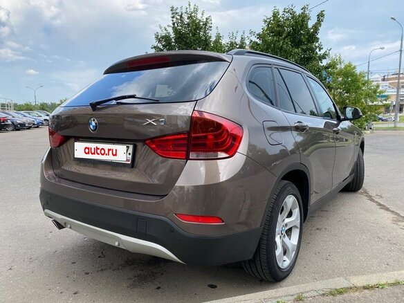 2013 BMW X1 18i I (E84) Рестайлинг, коричневый, 1470000 рублей - вид 5