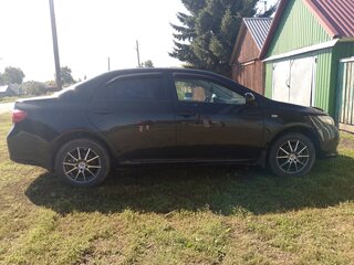 2008 Toyota Corolla X (E140, E150), чёрный, 850000 рублей, вид 2