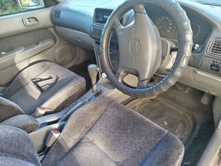 1999 Toyota Corolla VIII (E110), белый, 170000 рублей, вид 3