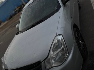 2013 Nissan Almera III (G15), серебристый, 550000 рублей, вид 2