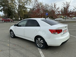 2012 Kia Cerato 6-speed II, белый, 1130000 рублей, вид 4
