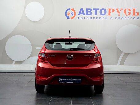 2011 Hyundai Solaris I, красный, 565000 рублей, вид 4