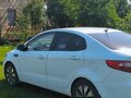 2012 Kia Rio 4-speed III, белый, 875000 рублей - вид 3